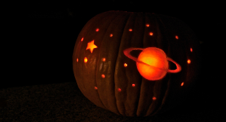 Illustration for article titled Show Us Your Science-Themed Pumpkin Carvings